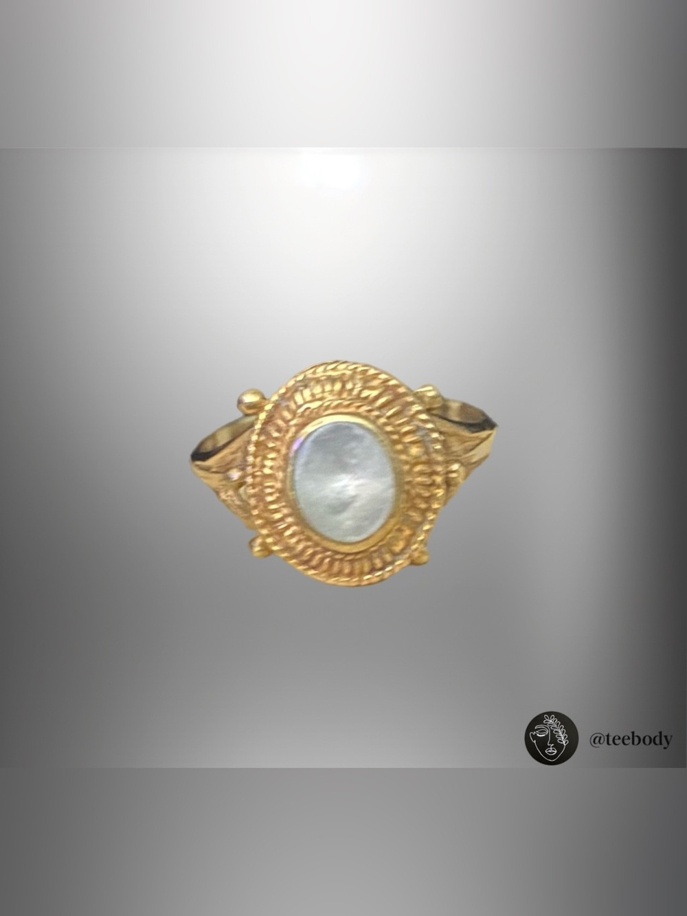 Gold-Tone Ring with White Mother-of-Pearl Center